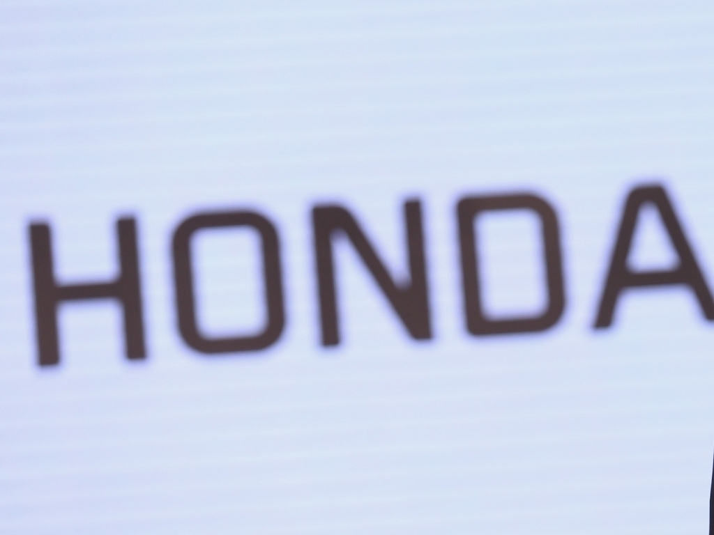 Red Bull ‘working hard with Honda’
