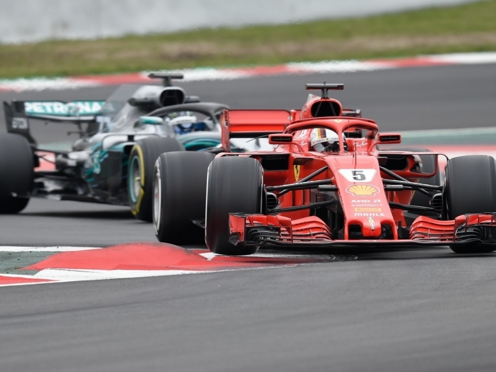 Vettel quickest as snow interrupts play in Spain