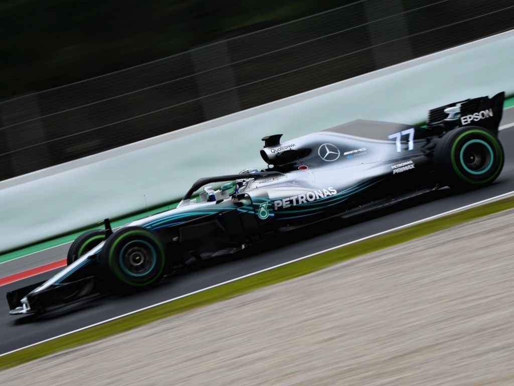 Bottas quickest on drying Barcelona circuit