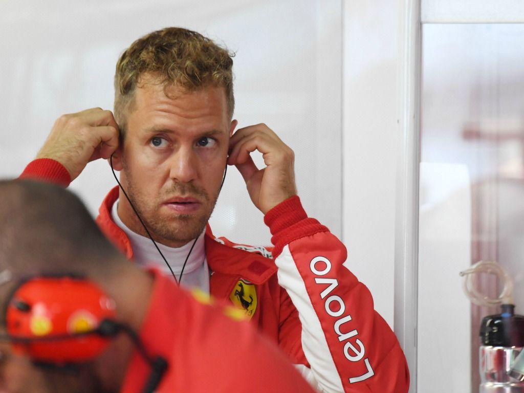 Vettel expects three-way battle for pole position