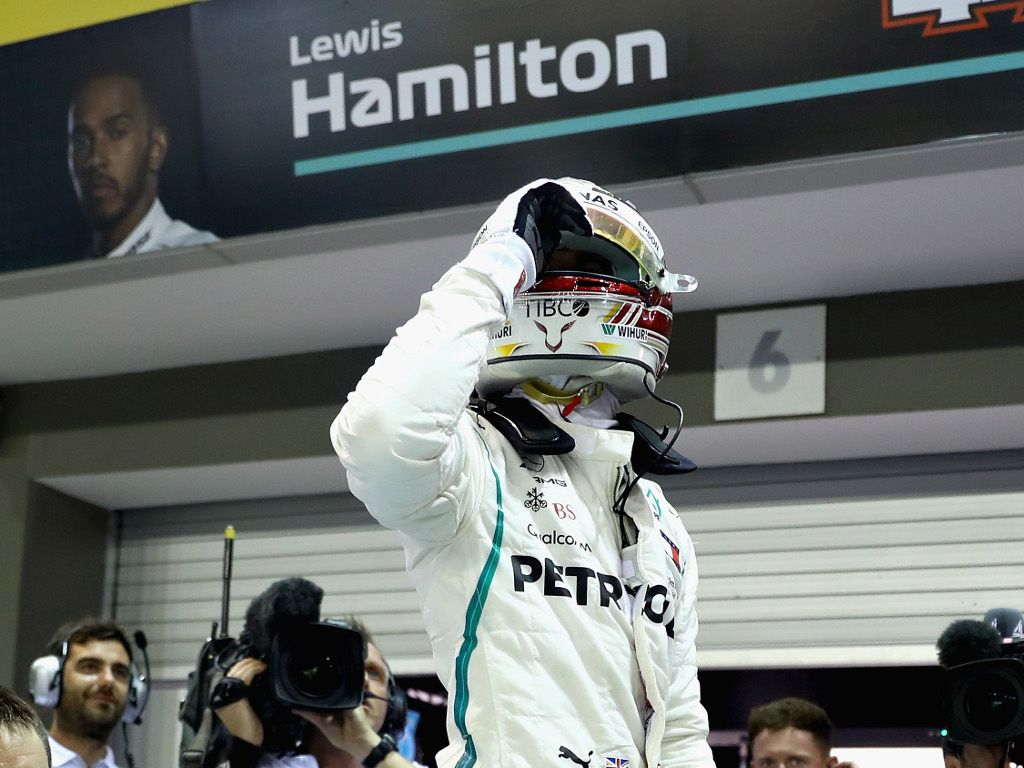Race: Hamilton holds off Verstappen for Singapore win