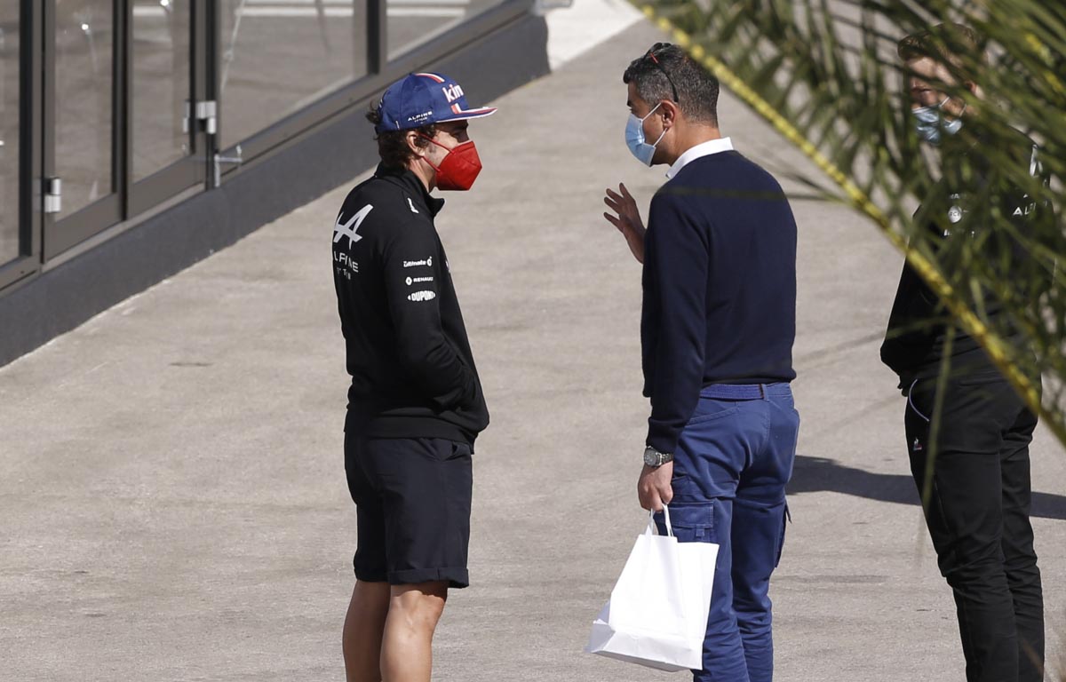 Fernando Alonso and Michael Masi chat. Turkey October 2021.