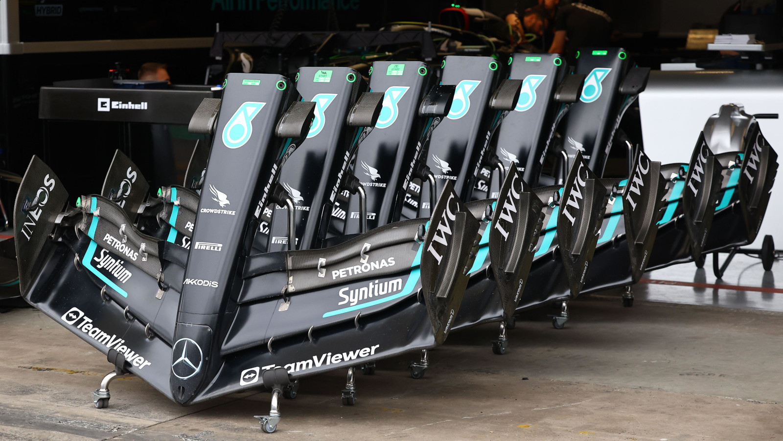 Mercedes' stacked front wings for the W14 in the pit lane.