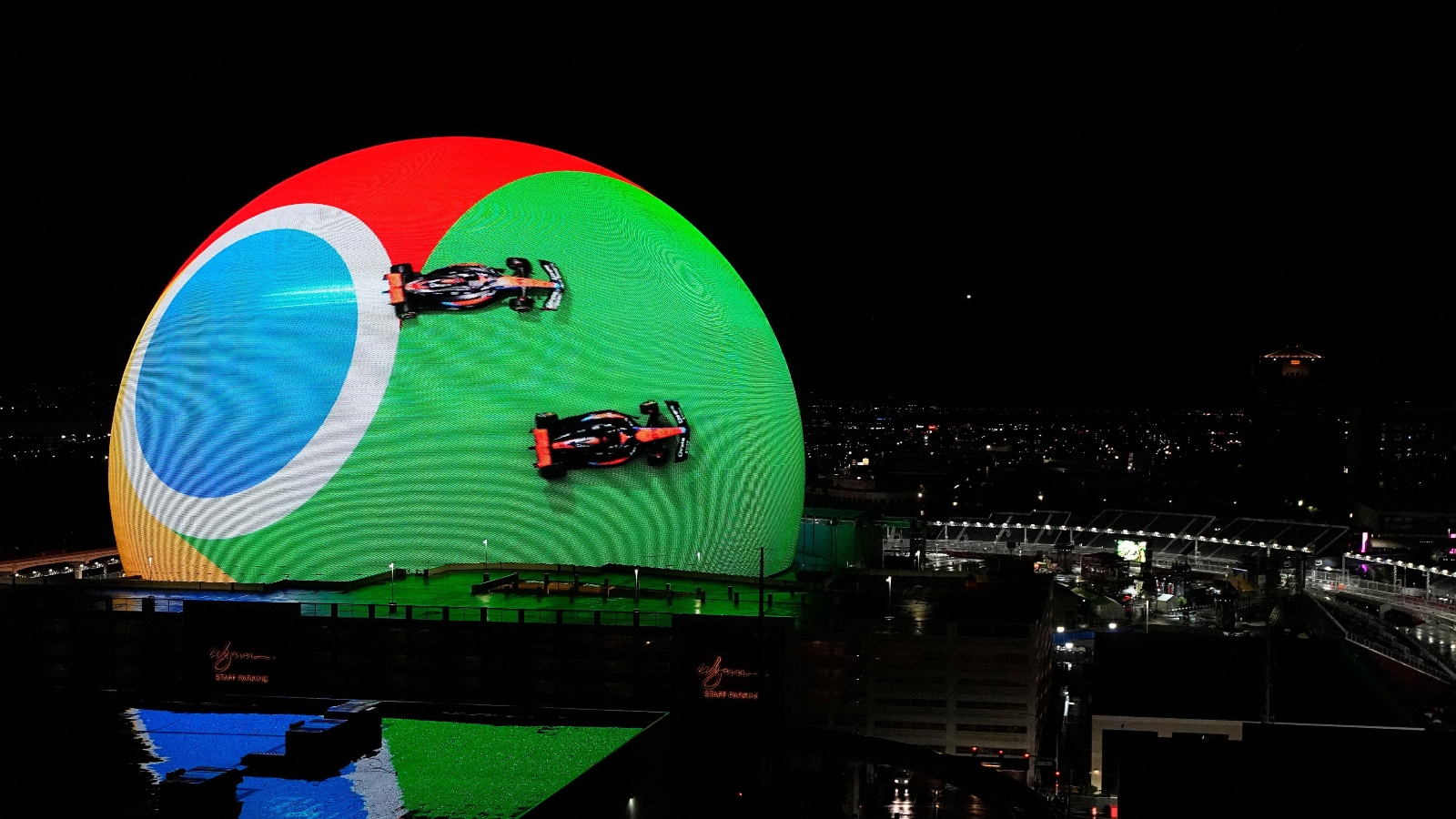 The Las Vegas Sphere with McLaren cars projected on it.