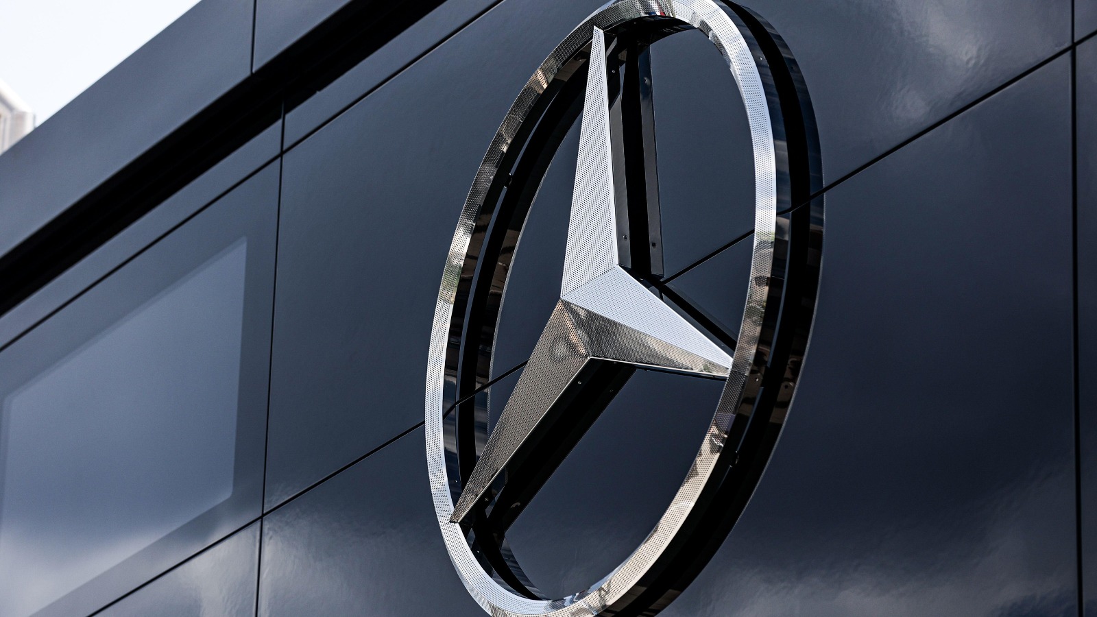 The Mercedes logo.