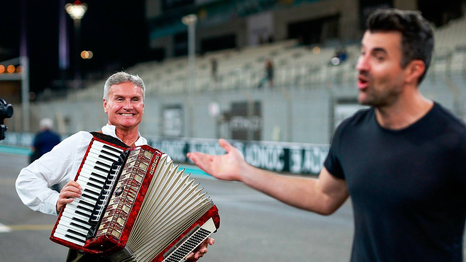 Eddie Jordan cringes as DC armed with accordian for end of F1 2023 song