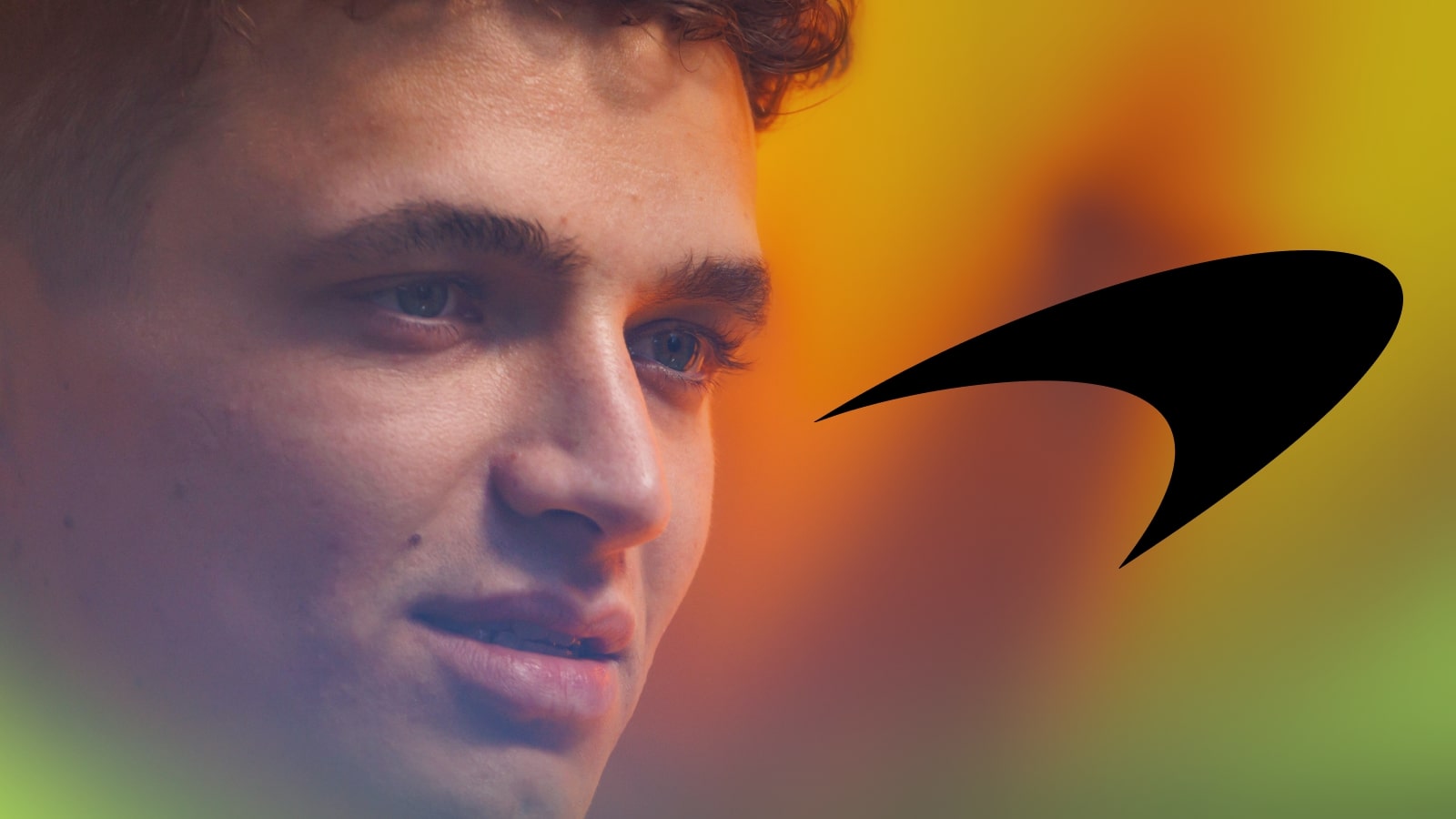 A close-up shot of Lando Norris speaking to the media with a prominent McLaren logo alongside him