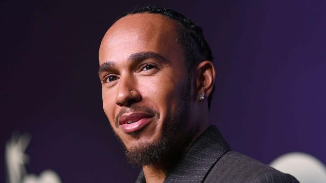 Lewis Hamilton on a red carpet.