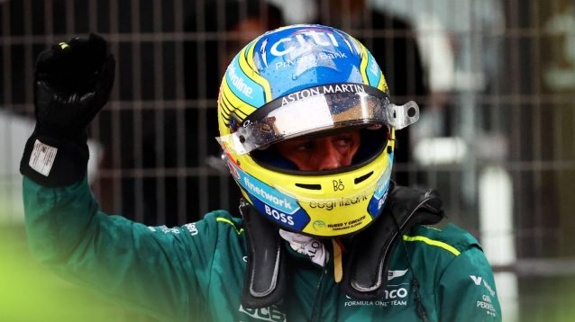 Fernando Alonso waves to the crowd after qualifying third for the Chinese Grand Prix sprint race