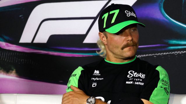 Valtteri Bottas sits with his arms folded in a press conference. F1 news