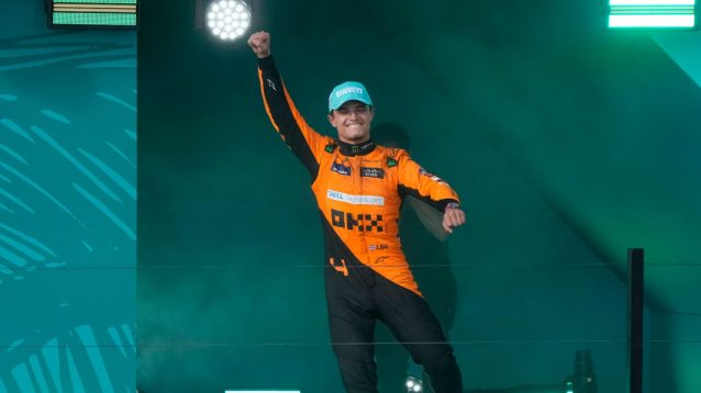 McLaren's Lando Norris celebrates his Miami win with a fist in the air.