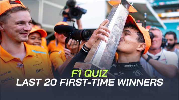 Lando Norris kisses the trophy