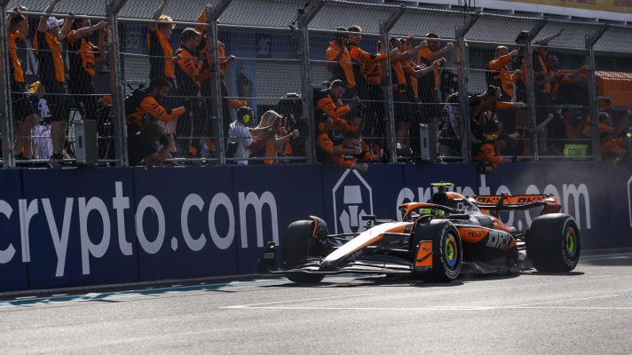 Lando Norris cheered on by his McLaren team