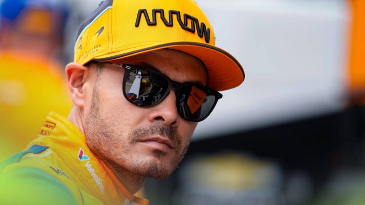 Kyle Larson waits for the start of practice for the Indianapolis 500