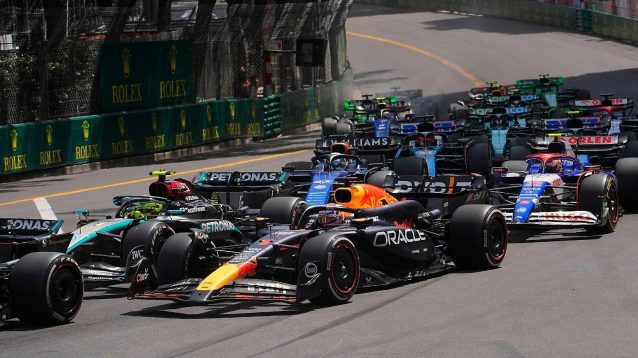 Lewis Hamilton, Mercedes, and Max Verstappen, Red Bull, drive side-by-side at the 2024 Monaco Grand Prix.