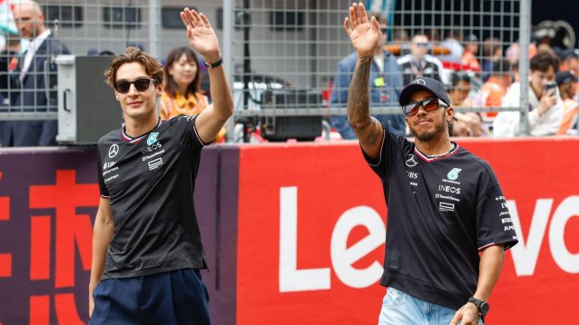 Mercedes drivers George Russell and Lewis Hamilton wave to fans at the 2024 Chinese Grand Prix.