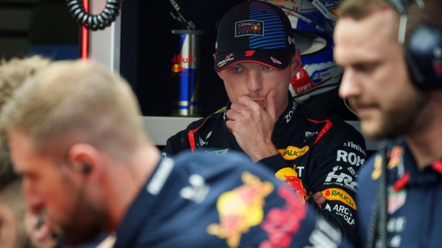 Max Verstappen looks concerned as Red Bull work on his RB20 at the Canadian Grand Prix.