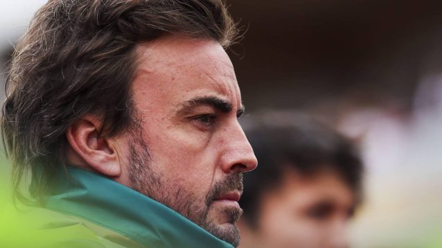 A side-profile shot of Fernando Alonso on the grid in Canada