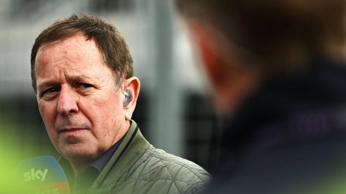 Martin Brundle looks at a colleague while on duty for Sky F1 at the Canadian Grand Prix