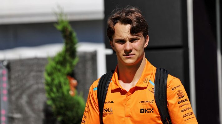 Oscar Piastri arriving into the paddock