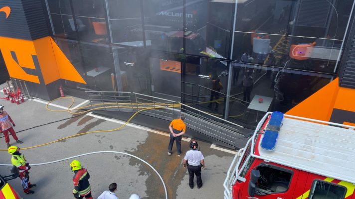 McLaren Racing CEO Zak Brown assesses the damage after a hospitality fire at the 2024 Spanish Grand Prix.