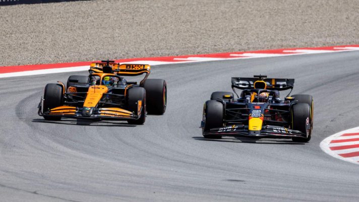 Red Bull driver Max Verstappen goes by McLaren's Oscar Piastri during the 2024 Spanish Grand Prix.