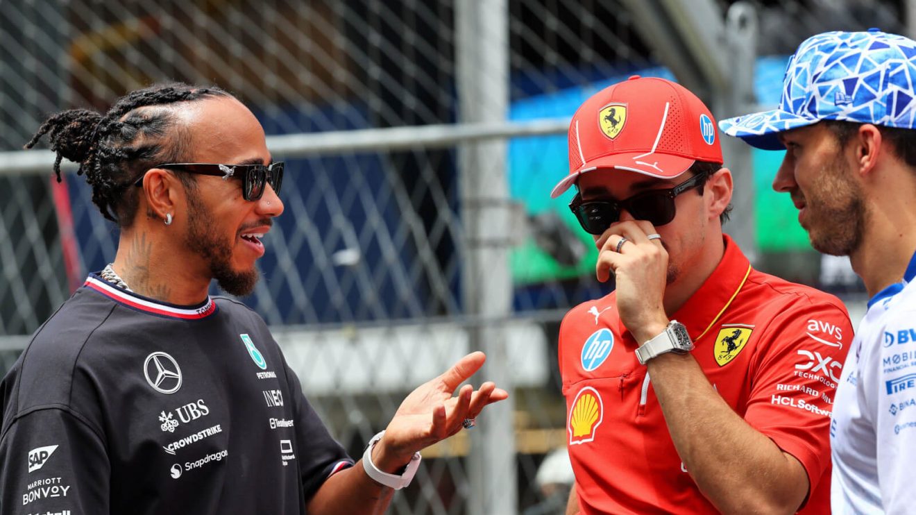 Lewis Hamilton chatting with Charles Leclerc and Pierre Gasly