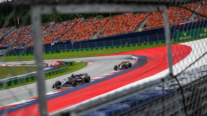 George Russell and Sergio Perez at the 2023 Austrian Grand Prix, which saw over 1,200 track limits violations throughout the weekend