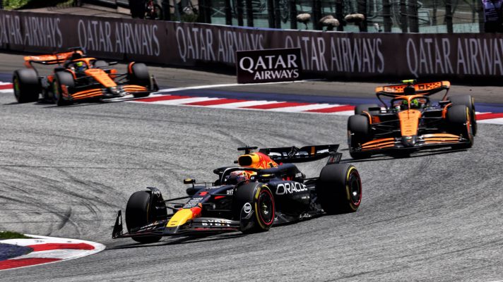 Max Verstappen leads the McLarens