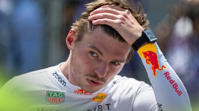 Max Verstappen runs his hand through his hair