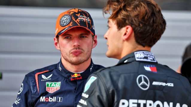 Max Verstappen speaking to George Russell