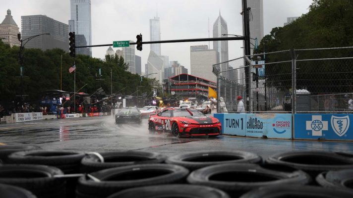 Christopher Bell races on a wet track during NASCAR's Chicago street race weekend