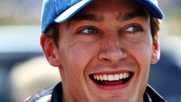 A broad smile from Mercedes' George Russell at the 2024 British Grand Prix.