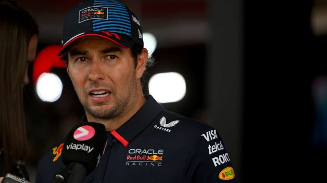 Sergio Perez of Red Bull Racing gives an interview during the Austrian Grand Prix