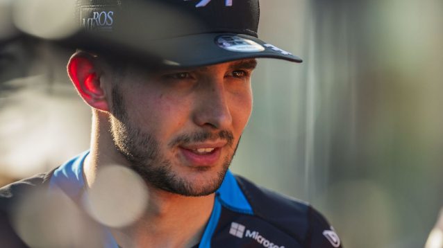 Esteban Ocon in the F1 paddock