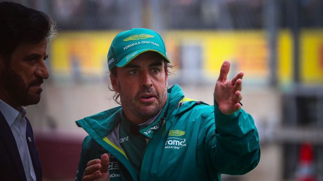Fernando Alonso speaking with Mohammed Ben Sulayem