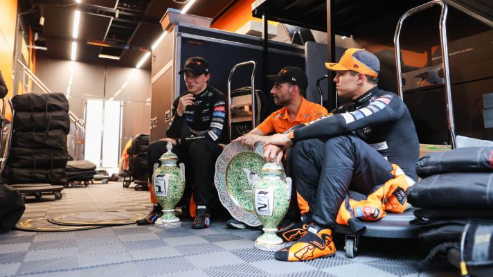 McLaren's Lando Norris and Oscar Piastri pictured with team boss Andrea Stella after the 2024 Hungarian Grand Prix.