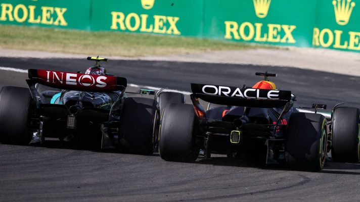 Mercedes' Lewis Hamilton and Red Bull's Max Verstappen battle at the 2024 Hungarian Grand Prix.