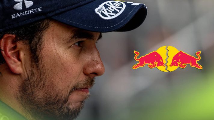 A side-profile shot of Sergio Perez with a cracked Red Bull logo alongside him