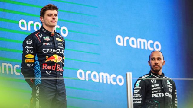 Lewis Hamilton glances in Max Verstappen's direction during the podium ceremony in Barcelona