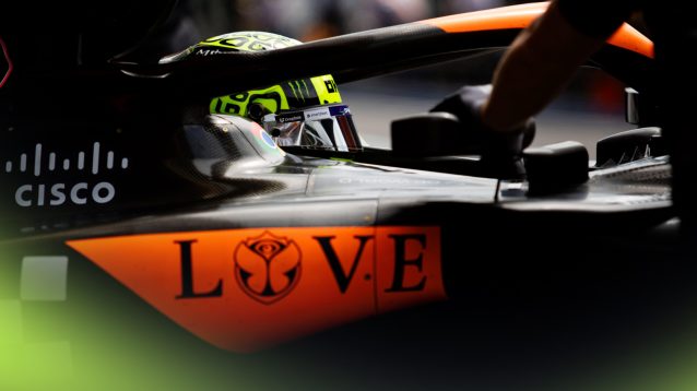 Lando Norris is rolled back into the McLaren garage at Spa