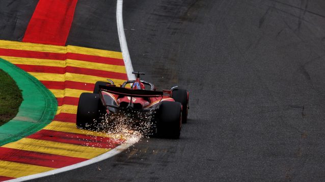 Charles Leclerc sparks as he rides the kerbs at Spa