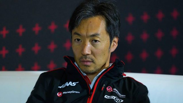 Haas team principal Ayao Komatsu looking serious in a press conference at the 2024 British Grand Prix.