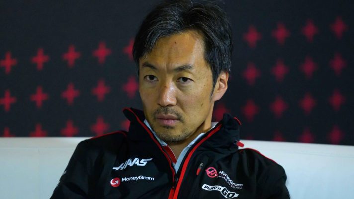 Haas team principal Ayao Komatsu looking serious in a press conference at the 2024 British Grand Prix.