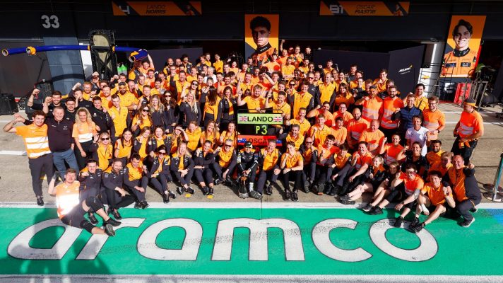 The McLaren team celebrate with Lando Norris and Oscar Piastri