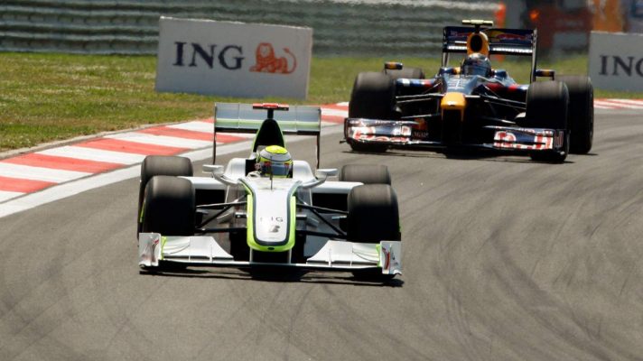 Brawn GP's Jenson Button leads Red Bull's Sebastian Vettel at the 2009 Turkish Grand Prix.