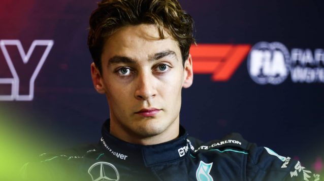 George Russell looks serious in the post-qualifying press conference at Monza