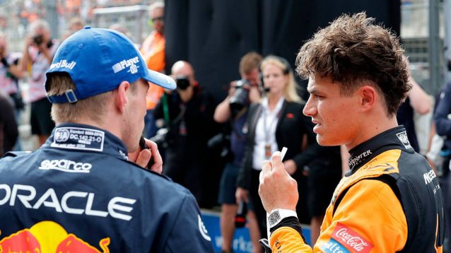 Max Verstappen in conversation with Lando Norris