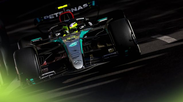 A front-facing shot of Lewis Hamilton on track in Baku