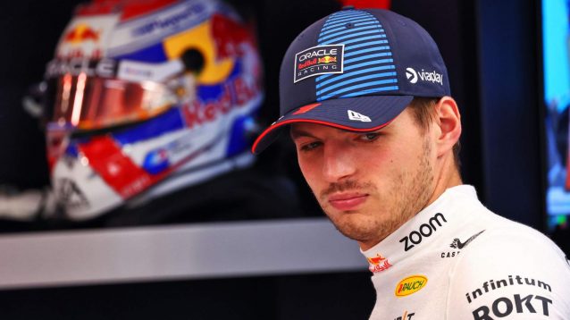 Max Verstappen in the garage.
